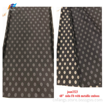 100% polyester Nnida folie metalliskt präglat tyg